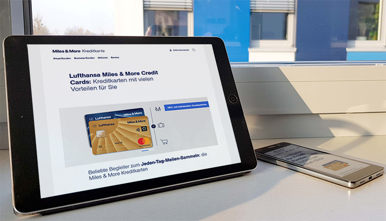 Website der Lufthansa Miles & More Credit Card auf einem Tablet
